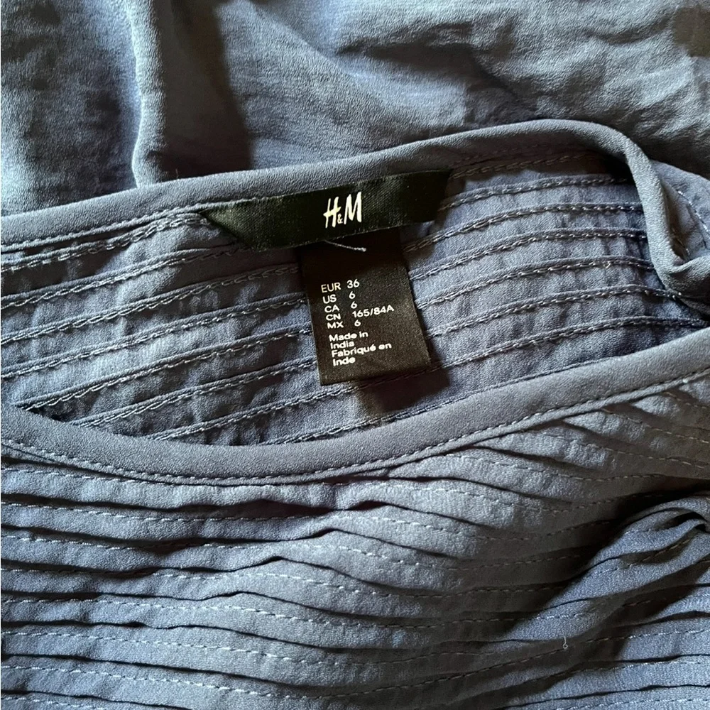 H & M Blue/Slate Dress. Smocked detail at the neckline, Ruffle Sleeves. Size 6 - Picture 7 of 7